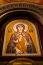 Belgrade, Serbia - December 20, 2022: Mary the Mother of God with her son Jesus Christ fresco in mozaic in orthodox teple Royalty Free Stock Photo