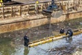 Divers working on river bank protection