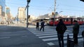 Belgrade / Serbia - January 24, 2020: pedestrian crossing with people on Slavia Square in the center of Belgrade. Active traffic,