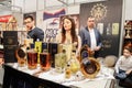 Selective blur on Various bottles of rakija, of different fruits sizes and flavours, on display.