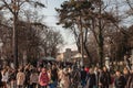 BELGRADE, SERBIA - JANUARY 1, 2021: Selective blur on a crowd of people walking in Kalemegdan park by Monument of gratitude to