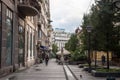 People walking on the pedestrian street of Ulica Vuka Karadzica Venac during a cloudy grey afternoon in Stari Grad, the historical Royalty Free Stock Photo