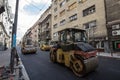 Road roller, small model, on display during a road renovation in belgrade A road roller, or compactor, is used for asphalt Royalty Free Stock Photo