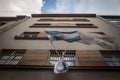 Sign indicating the Argentinian embassy of Belgrade with flags of Argentina and mercosur.