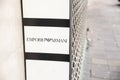 BELGRADE, SERBIA - JULY 16, 2023: Selective blur on an Emporio Armani logo on their main retailer in Belgrade Serbia. Emporio