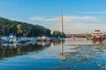 Belgrade, Serbia - 20 June, 2018: Side view of Ada bridge with reflection over Belgrade marina on Sava river Royalty Free Stock Photo