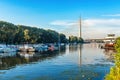 Belgrade, Serbia - 20 June, 2018: Side view of Ada bridge with reflection over Belgrade marina on Sava river Royalty Free Stock Photo