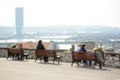 Belgrade, Serbia - March 7, 2023: People are relaxing on benches on observation deck of Kalemegdan Park located nearby Belgrade