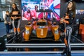 Beautiful hostess girls standing next to the racing sports car at the Belgrade Car and Motor Show in Belgrade, Serbia Royalty Free Stock Photo