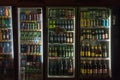 Fridges full of serbian beer and other alcoholic drinks in a beverages aisle of a retail shop,