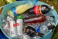 Cooling drinks in ice in nature. Cooling of alcoholic beverages, beer, wine, coca cola and soda Royalty Free Stock Photo