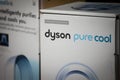 Selective blur a Dyson logo on a pure cool vacuum cleaner.
