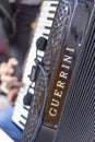 Belgrade, Serbia - 27. May 2020. Guerrini Accordion with microphones and blurred hand playing