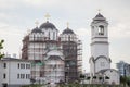 Novi Beograd Orthodox church currently in construction, with scaffoldings and workers, in New Belgrade