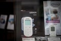 Omron logo on a HeatTens, a Tens Pain Relief Machine for sale in a Belgrade reseller. Omron is a Japanese electronics manufacturer