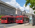 Belgrade, Serbia - May 30, 2021: Red Trolleybuses at Students Square in downtown Belgrade, capital of Serbia