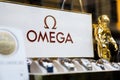 Belgrade, Serbia - November 15, 2021: Omega watch logo in the Omega store in Belgrade, Serbia. Omega watches date from the 19th