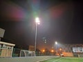 Belgrade, Serbia, October 29, 2020 stadium in lights and flashes. Empty beautiful football field with glowing spotlights in the Royalty Free Stock Photo