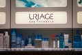 Uriage logo on a shelf of products of the brand. Royalty Free Stock Photo