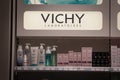Vichy Laboratoires logo on a shelf of products of the brand.