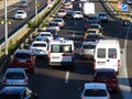 The ambulance car breaks through the traffic jam in rush hour