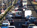 The ambulance car breaks through the traffic jam in rush hour