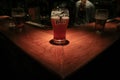 Selective blur on a glass of Jelen Pivo Beer on a counter of a bar. Royalty Free Stock Photo