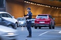 Policeman on duty, standing in the intersection