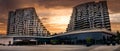 Belgrade Waterfront buildings with strong clouds colorful sunset.