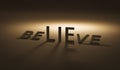 Believe concept of lie on dark background and belief. Lies or trust. Realistic 3D render