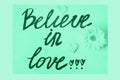 Believe in love written on mint green