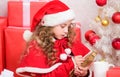 Believe in miracle. Send letter for santa. Wish list. Child santa costume enjoy christmas eve. Child write letter to