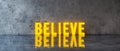 Believe text sign on concrete wall 3d render