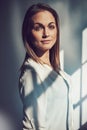 Believe in you and be unstoppable. a beautiful young businesswoman standing in a modern office. Royalty Free Stock Photo