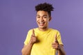 Believe in you. Portrait of cheerful young optimistic guy encuraging to keep going, pointing fingers at camera with