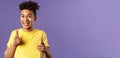 Believe in you. Portrait of cheerful young optimistic guy encuraging to keep going, pointing fingers at camera with