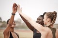 Believe in your abilities. a group of female athletes high fiving one another.