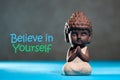 Believe In Yourself Confident Encourage Motivation Concept with meditating or praying baby buddha