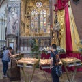 Bologna Cathedral, Believers inflame votiv candles, St. Peter`s Metropolitan Cathedral, Bologna