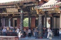 Believers piously worship in the Bangka Longshan Temple