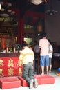 The believers pray at Muara Tebas Chinese temple, Kuching, Sarawak Royalty Free Stock Photo