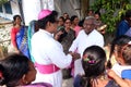 Believers welcome the bishop in front of Our Lady of Lourdes Church in Kumrokhali, India