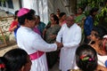 Believers welcome the bishop in front of Our Lady of Lourdes Church in Kumrokhali, India