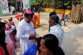 Believers welcome the bishop in front of Our Lady of Lourdes Church in Kumrokhali, India