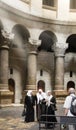 Believing women talk inside the Church of the Holy Sepulcher Temple of the Resurrection of Christ