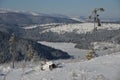 Winter lanscape with Belis-Fantanele lake near Marisel village, Apuseni mountains, Romania.