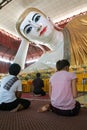 Belivers praying at the pagoda Chaukhtatgy of Yangon