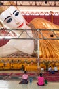 Belivers praying at the pagoda Chaukhtatgy of Yangon