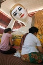 Belivers praying at the pagoda Chaukhtatgy of Yangon