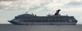 Belize coast - January 1, 2020: Aerial panoramic shot of Carnival Conquest anchored off the coast of Belize and a small tender Royalty Free Stock Photo